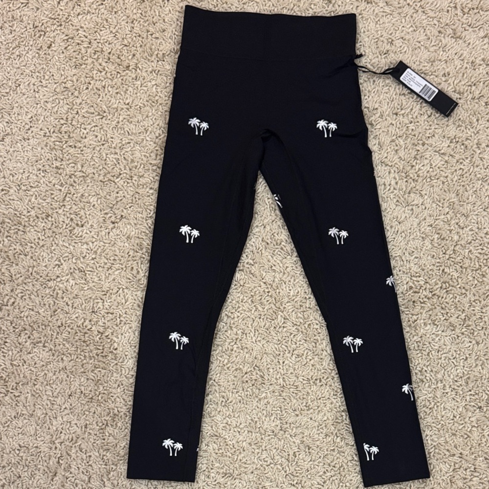 Stylish Black Leggings with Palm Tree Design